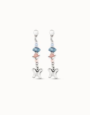 Uno de 50 Metamorphosis butterfly crystal drop earrings with faceted crystal pendants on a neutral background