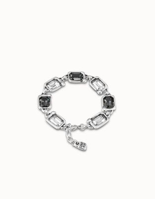 Uno de 50 Unexpected bracelet with nail-design detail in dual-tone finish and crystal accents worn on wrist in lifestyle setting