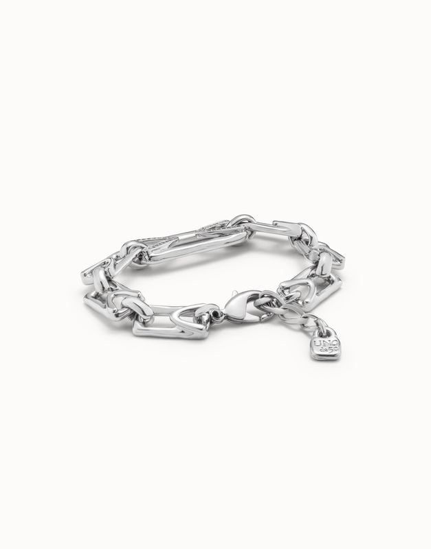 Uno de 50 Impressive topaz and sterling silver bracelet worn on wrist in natural light, showcasing the deep amber stone and polished metal design