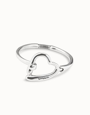 Uno de 50 Heartbeats silver-plated bracelet displayed on a neutral background, showing the detailed metalwork and finish of the bangle.
