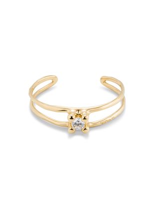 Uno de 50 Anima bracelet from the Spiritual Collection featuring blue and white crystals, worn on wrist in lifestyle setting