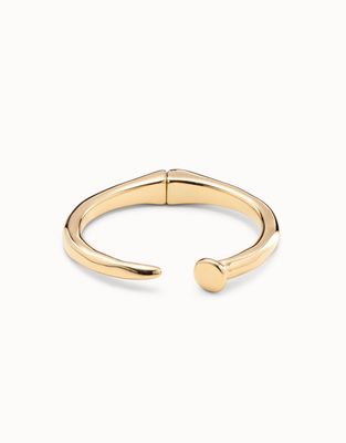 Uno de 50 handmade silver-plated rigid bracelet with nail-shaped design, displayed against a neutral background