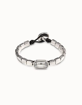 Uno de 50 Anaconda bracelet in silver-plated metal with white crystal accents, displayed on a neutral background