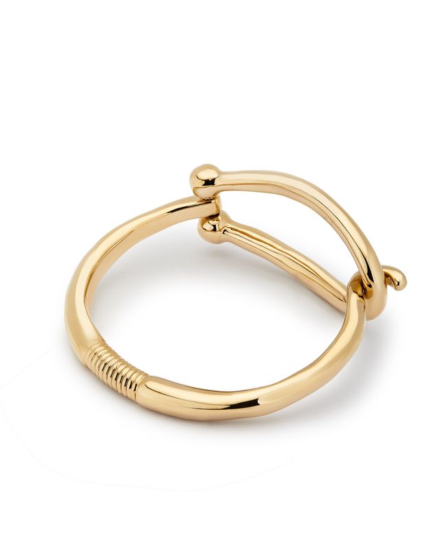 Uno de 50 multi-link teen bracelet from the Youthful Collection worn on a wrist, showing articulated silver-tone links and geometric details in a lifestyle setting