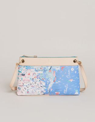 Virginia textured vinyl crossbody bag in studio lighting against a neutral background, showing the bag's structured silhouette and texture detail.