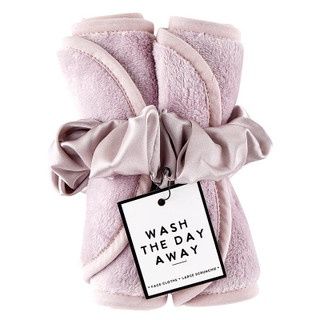 Reusable exfoliating face cloth set with matching scrunchie displayed on white background, showing textured weave fabric in neutral tones