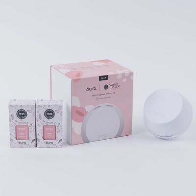Pura V4 smart diffuser with two Bridgewater Sweet Grace fragrance vials displayed on neutral background