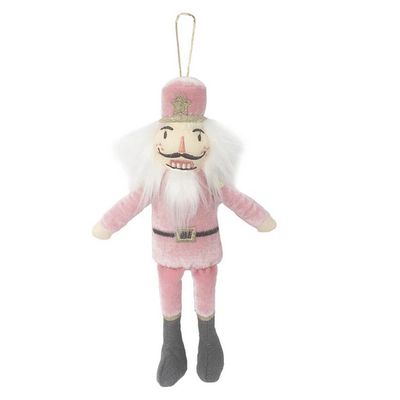 Mon Ami pink nutcracker Christmas tree ornament displayed against a neutral background in studio lighting