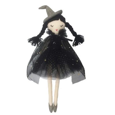 Mon Ami Cassandra witch doll, 15 inches tall, wearing a black tulle cape and braided hair, photographed against a plain background