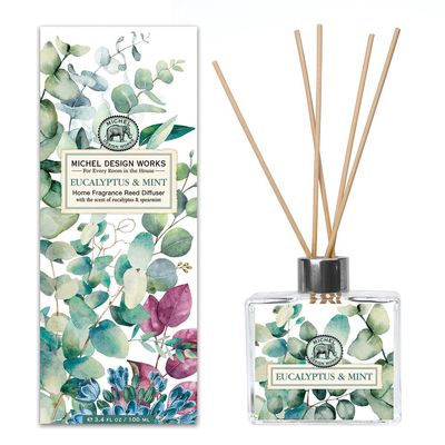 Michel Design Works Eucalyptus &amp; Mint Reed Diffuser with eight rattan reeds on a white background