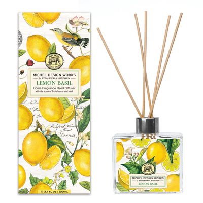 Michel Design Works Lemon Basil Reed Diffuser in a 3.4 oz glass decanter with reed sticks on a neutral background