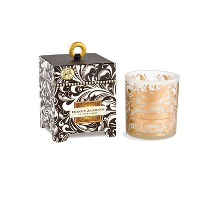 Michel Design Works Honey Almond soy candle in a 6.5 ounce glass vessel on a neutral background