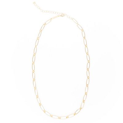 Gold-tone Cora layerable statement necklace from Michelle Mcdowell displayed on a neutral background