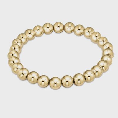 ENEWTON Classic Gold beaded stretch bracelet in 14kt gold-filled with 7mm round beads on white background