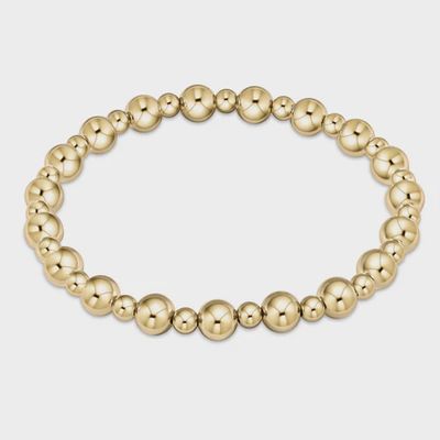 ENEWTON Grateful bracelet in 14kt gold-filled beads with 6mm spheres on a stretch cord, displayed against a neutral background