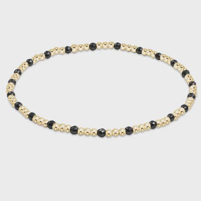 ENEWTON Sincerity bracelet with 2mm faceted hematite beads and 14kt gold-filled accents on white background