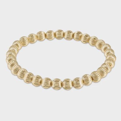 ENEWTON Dignity 6mm stretch bracelet in 14kt gold-filled beads on white background
