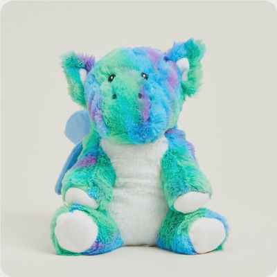 Warmies Baby Dragon microwavable plush in soft lavender with embroidered details, shown against a neutral studio background
