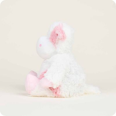 Warmies strawberry cow large plush toy with lavender scent in a cozy home setting