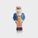 Nora Fleming Uncle Sam patriotic mini collectible figurine on white background, featuring red, white and blue details