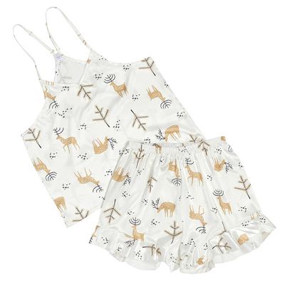 Bella IL Fiore Oh Deer satin cami and ruffled shorts pajama set in soft cream with deer print, displayed on a neutral background