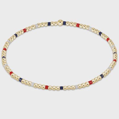 eNewton Hope Sincerity Firecracker 2mm beaded bracelet in 14k gold-filled, displayed against a neutral background