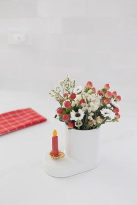 Nora Fleming Light the Way holiday mini collectible accent displayed in a lifestyle setting