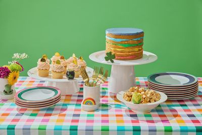 Nora Fleming Get Lucky mini pot of gold decor displayed in a lifestyle setting for St. Patrick's Day.