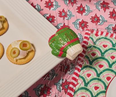 Nora Fleming Smitten Mittens mini decorative accent displayed in a winter lifestyle setting