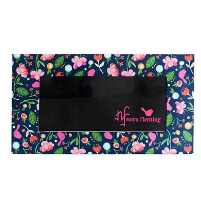 Nora Fleming floral keepsake box with magnetic closure, designed to hold six minis, photographed against a neutral background