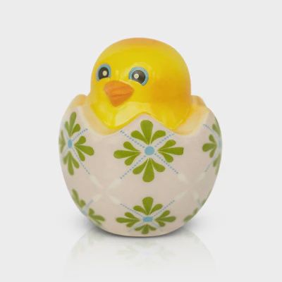 Nora Fleming One Cool Chick Easter egg decorative mini in studio lighting against a neutral background