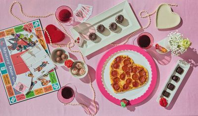 Nora Fleming Sweet On You chocolate strawberry mini displayed in a lifestyle setting with coordinating tableware and decor
