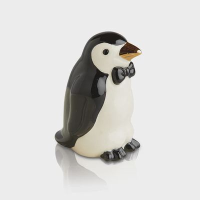 Nora Fleming Tiny Tuxedo Penguin Mini ceramic figurine with black and white coloring on neutral background
