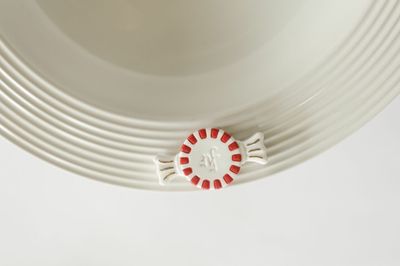 Nora Fleming Peppermint Dreams holiday mini displayed in a festive lifestyle setting with seasonal decorations