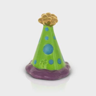 Nora Fleming Hats Off to 20 Years party hat mini ceramic attachment in studio setting