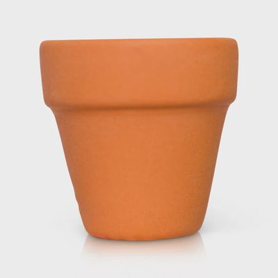 Nora Fleming Can You Dig It terracotta pot mini in rust-orange clay against a white background