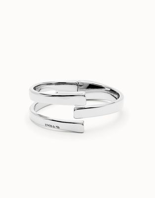 Uno de 50 Ser Original geometric bangle bracelet with angular brass design on white background