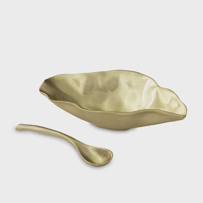 Beatriz Ball medium bowl and spoon set in brushed gold finish, displayed on a neutral background in studio lighting