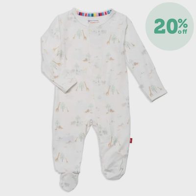 White modal magnetic footie with serene safari print, laid flat on neutral background in studio setting