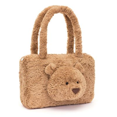 Jellycat Bartholomew Bear tote bag with plush fur handles and zip closure on white background