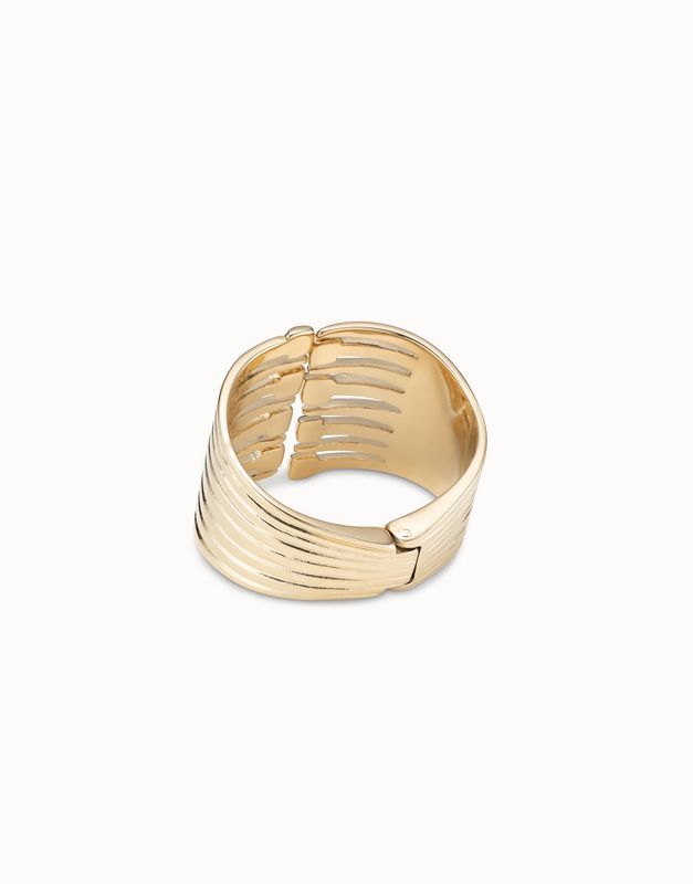 Uno de 50 Loved Collection nail-head matching bracelet in handmade silver, worn on wrist in lifestyle setting
