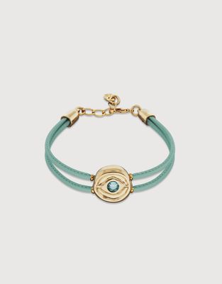 Uno de 50 Ser Intuitiva bracelet featuring double leather straps in rich tones with gold-plated eye detail, shown against neutral background