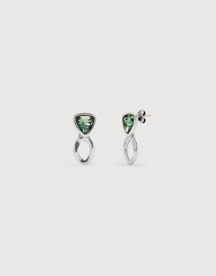 Uno de 50 Ser Camaleónica green crystal stud earrings displayed against a neutral background, showing iridescent green stone detail and metal setting
