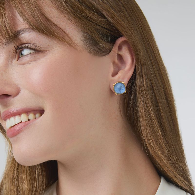 Honey rose-cut glass stud earrings with gold bezel settings, displayed on a neutral surface in natural light