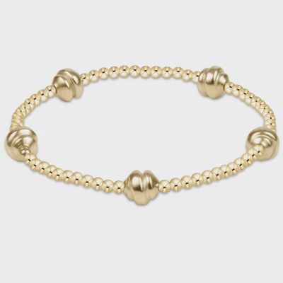 14kt gold-filled beaded bracelet with 2.5mm smooth round beads on a neutral background, displayed at wrist length
