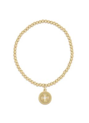 Gold-filled 3mm beaded stretch bracelet with small cross disc charm on white background