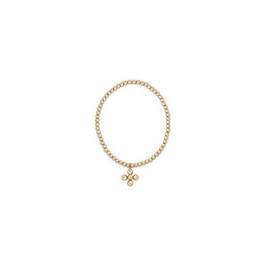 Gold-filled beaded bracelet with 3mm spheres and 4mm signature cross charm worn on wrist in natural light