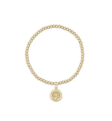 14kt gold-filled beaded bracelet with 3mm spheres and St. Christopher medal charm, worn on wrist in lifestyle setting