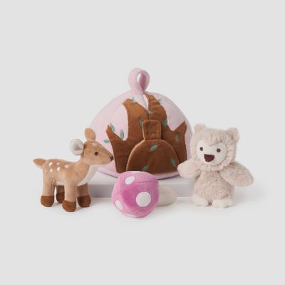Woodland plush toy set with soft animals and sensory sound features displayed with gray carrying case on white background