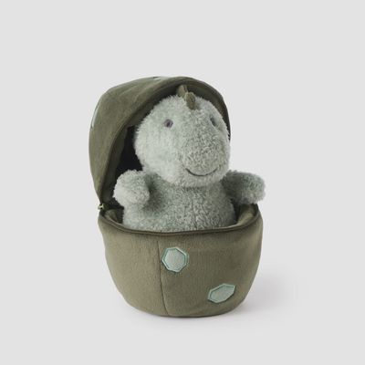 Plush dinosaur toy with detachable egg-shaped pouch featuring a zippered opening, displayed against a plain background